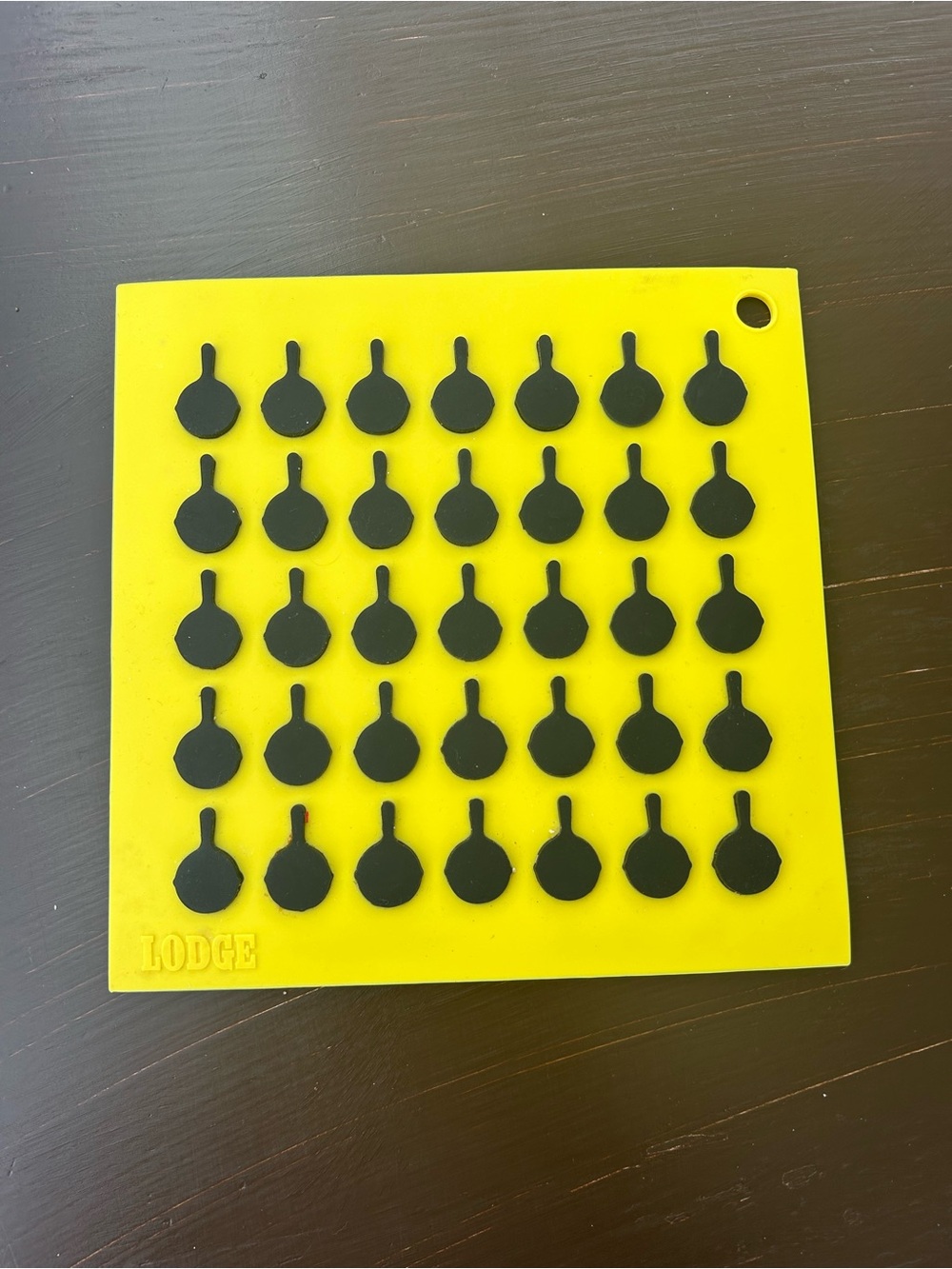 Lodge Yellow Silicone Trivet with Black Skillet Pattern